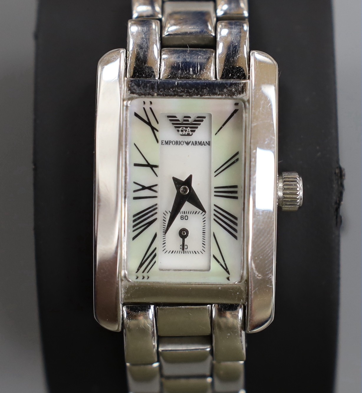 A lady's modern Emporio Armani quartz wrist watch, with mother of pearl dial and box.